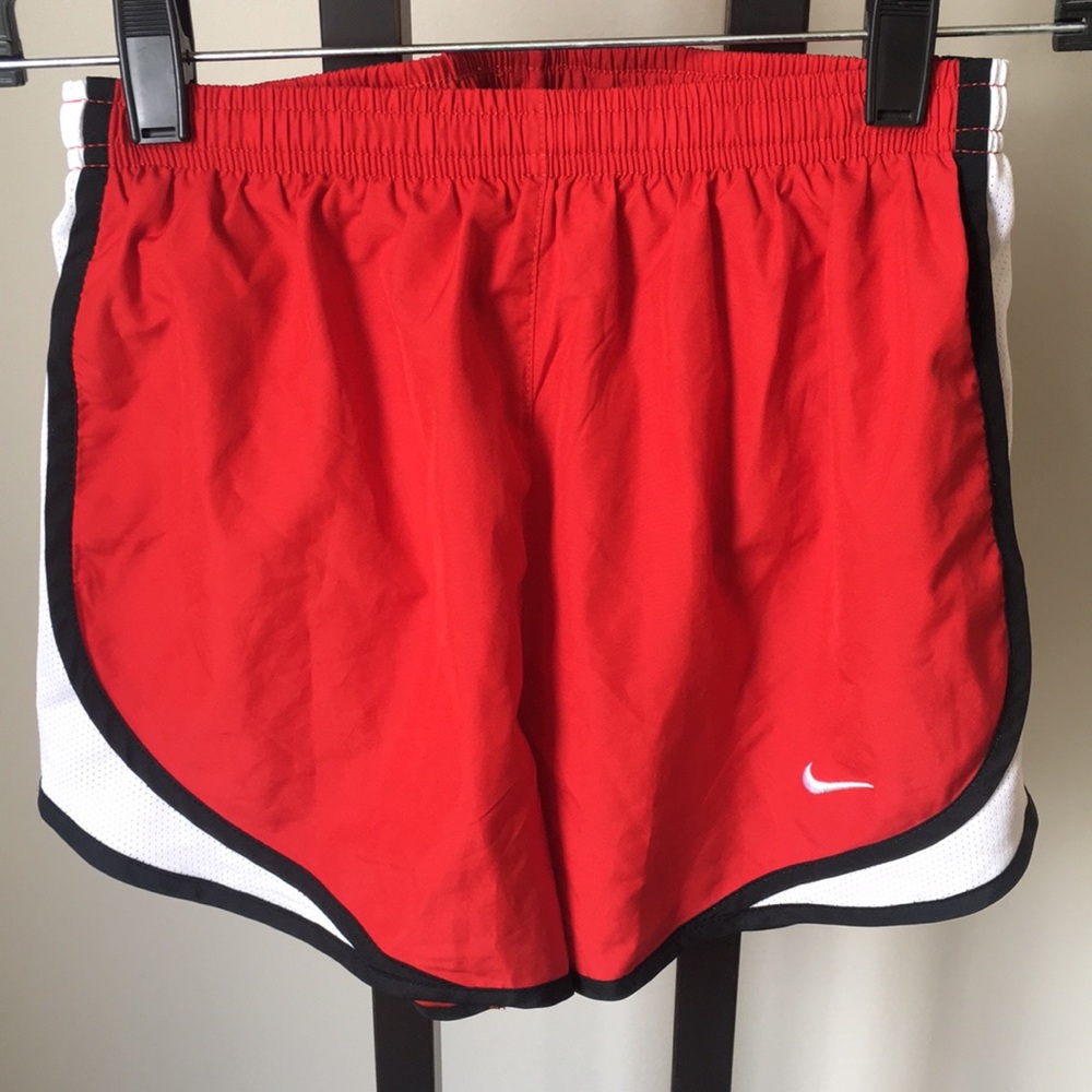 Red Nike running shorts